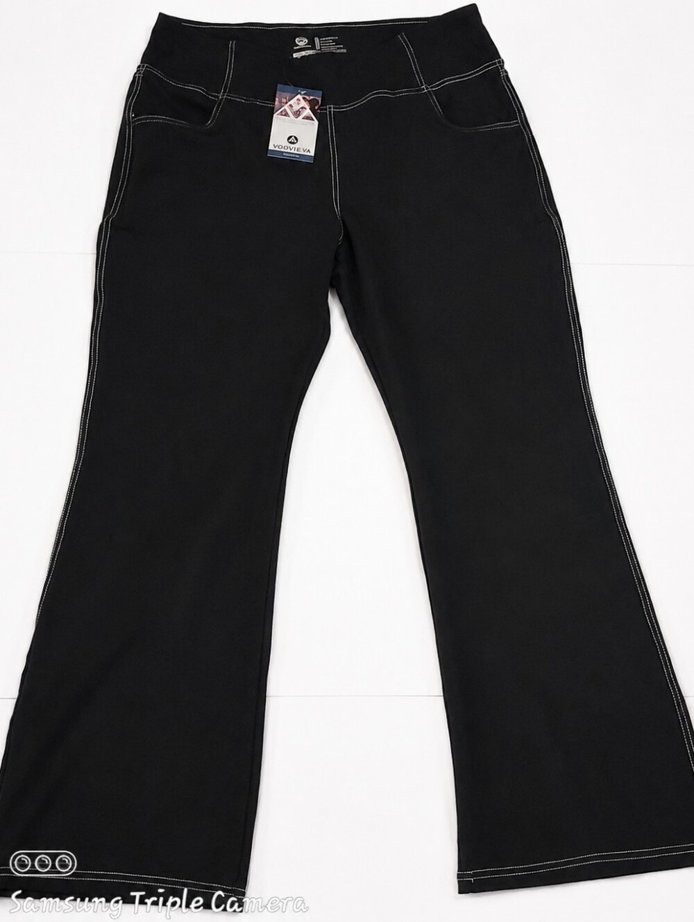 New with tags VOOVEGYA charcoal bootcut/flared yoga pants, size 3XL.